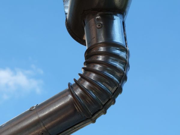 Metal Downspout Installation in Peyton