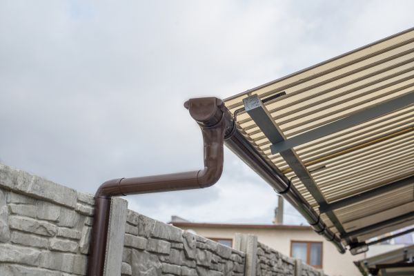 Plastic Downspout Installation in Peyton